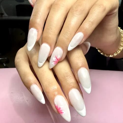Long white nails with soft pink accent art
