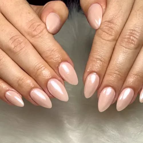 Natural pink almond nails with a glossy finish