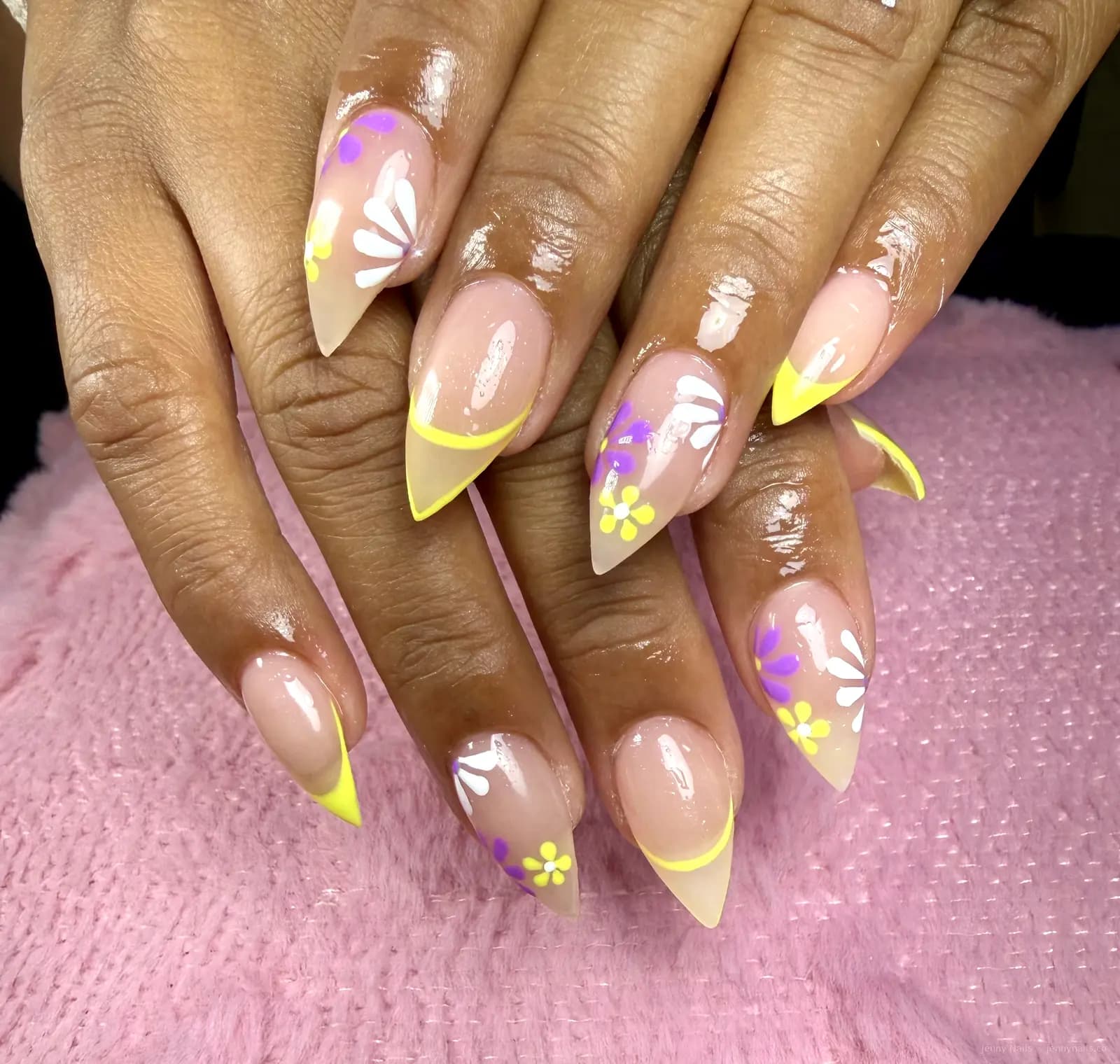 Yellow French tips with floral nail art